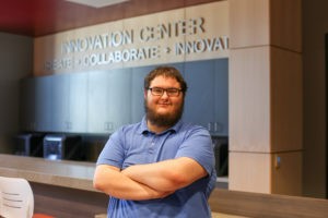 Jarrod Bruce, seated