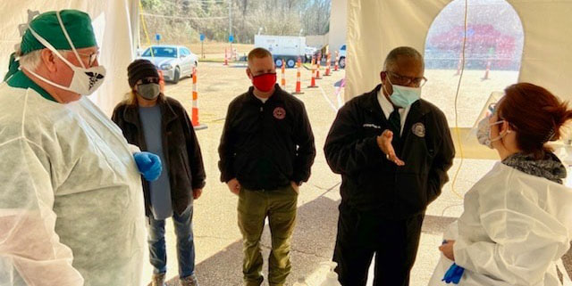 mayor flaggs vaccination site