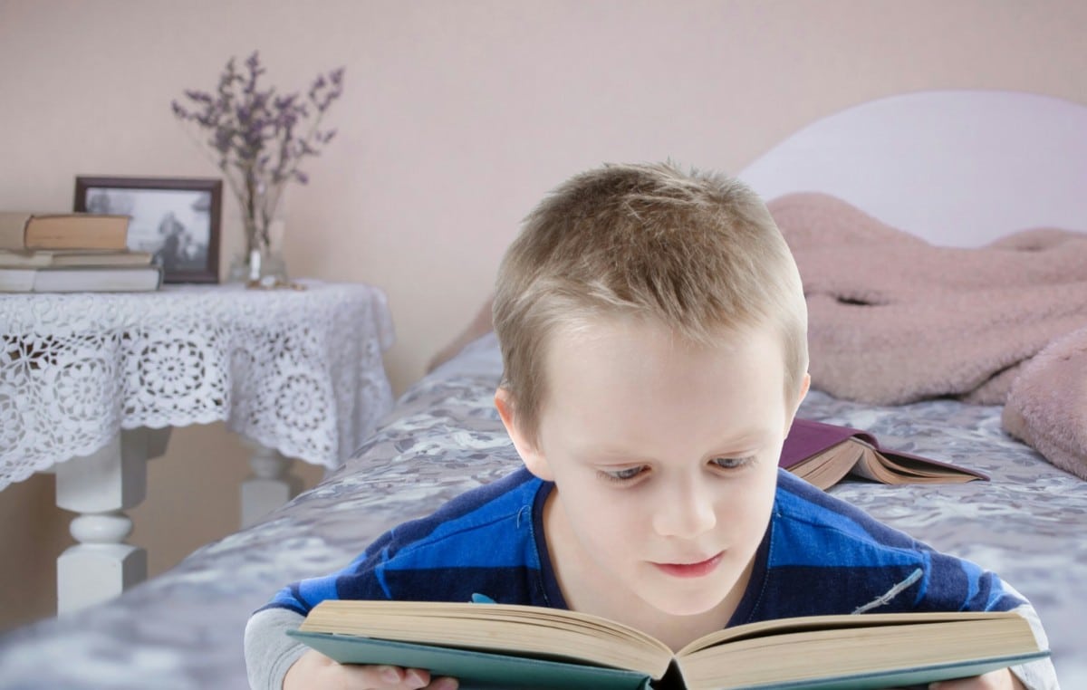 kid reading book