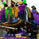 Mardi Gras celebrators overlook the parade Photo Credit: David Day