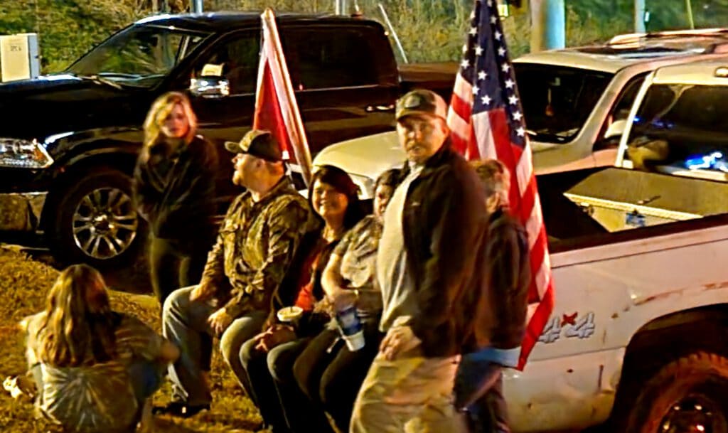 A group posted up on the South Frontage Road. Photo by David Day