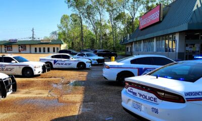 11 units and 14 officers responded to the call at Roses. Photo by David Day