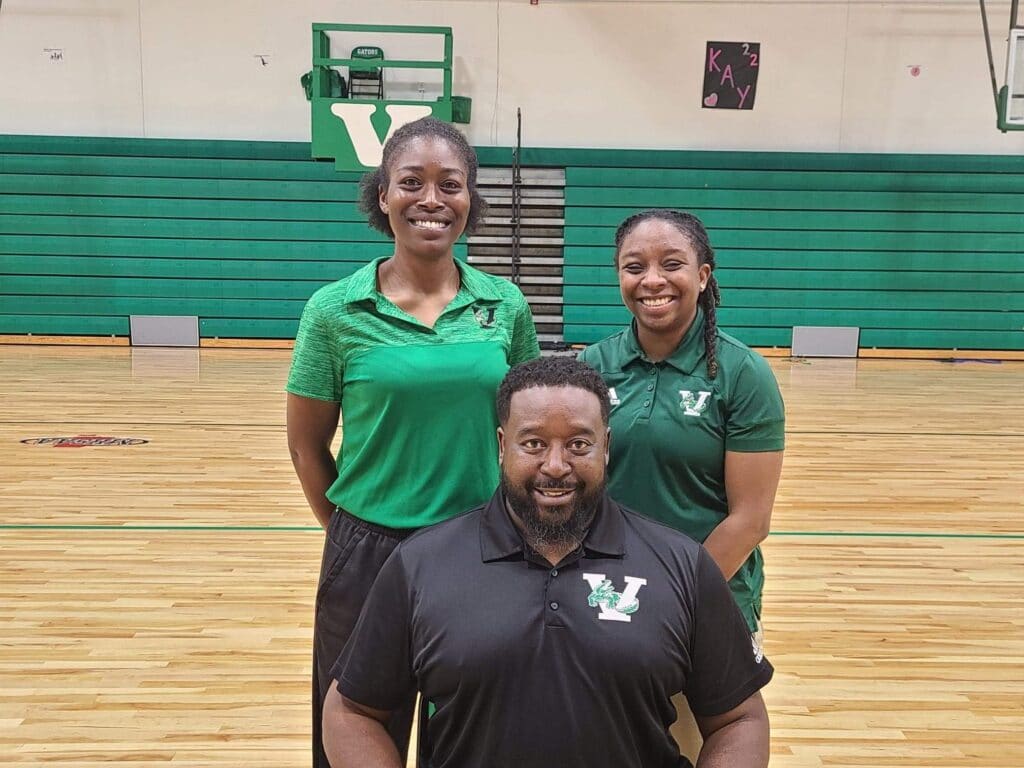 Sitting Troy Stewart. Standing L-R Deatra Cable and Valencia McFarland