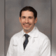 Dr. Adam Protos