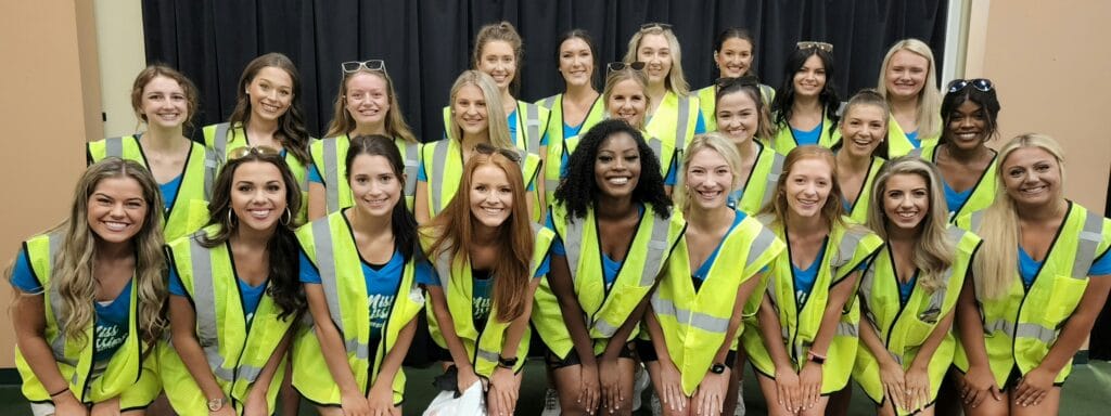 The Miss Mississippi contestants suited up to help clean up litter in the downtown area. Photo by David Day