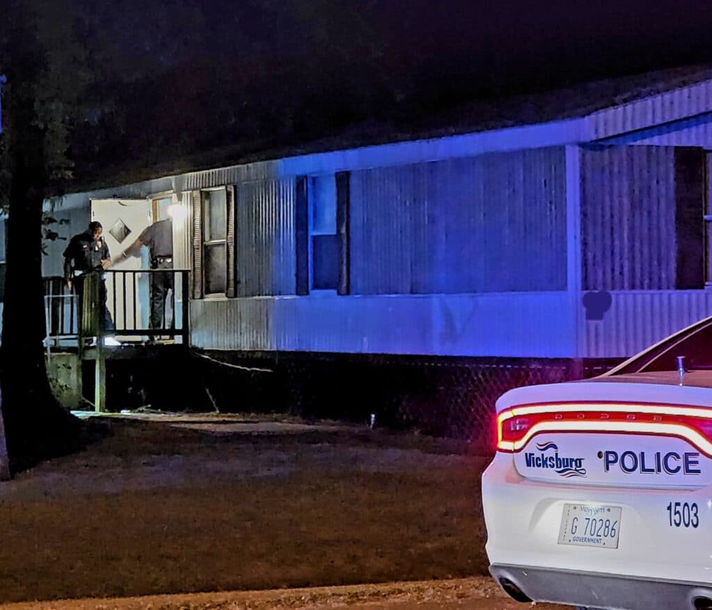 Police on the scene of an alleged shooting. Photo by David Day
