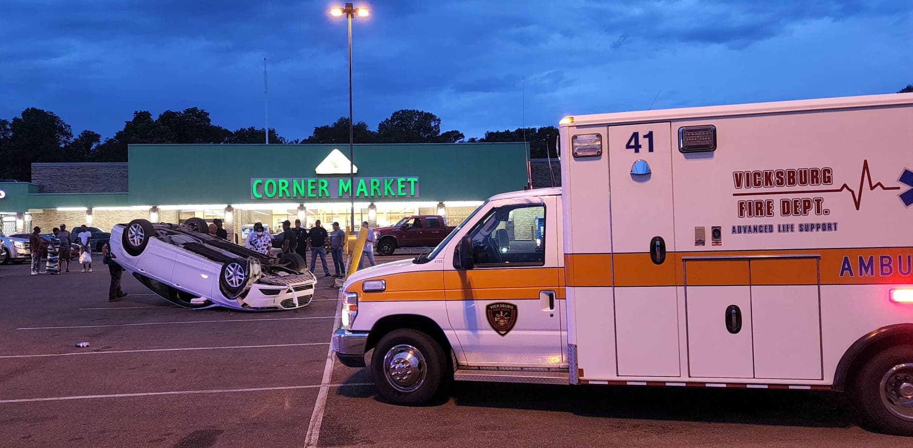 Rollover accident in Corner Market parking lot - Vicksburg Daily News