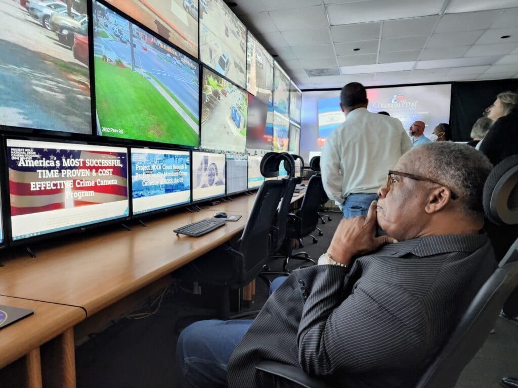 Mayor Flaggs studies the screen at Project NOLA. Photo by David Day