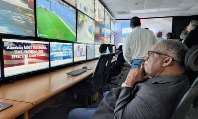 Mayor Flaggs studies the screen at Project NOLA. Photo by David Day
