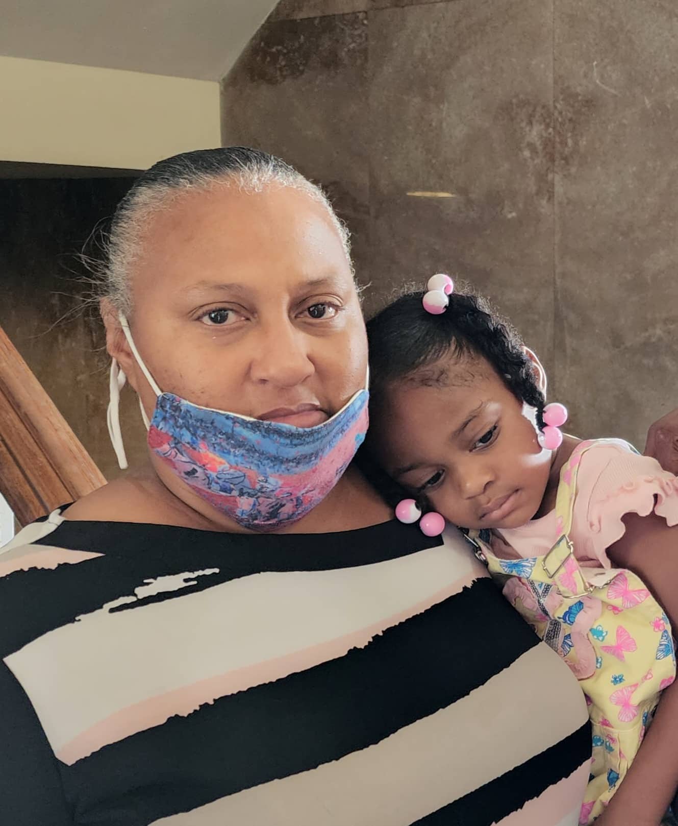 Donyell Johnson and grandaughter Sache, 3. Photo by David Day