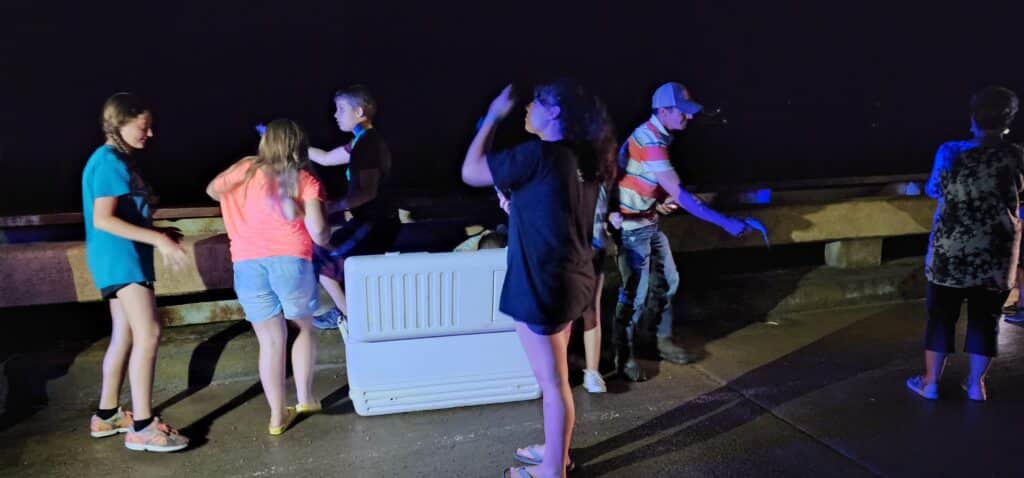 The racing fish are released into the Yazoo. Photo by David Day