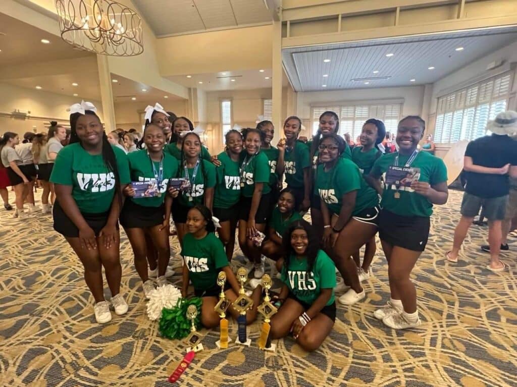 Vicksburg High Cheerleaders posing for pictures