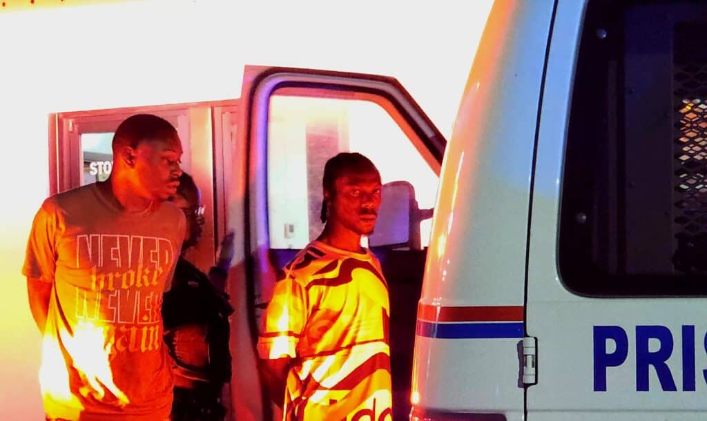 Two of the five people taken into custoy by the VPD. Photo by David Day