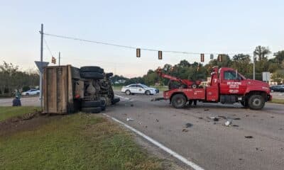 overturned dump truck river region
