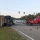 overturned dump truck river region