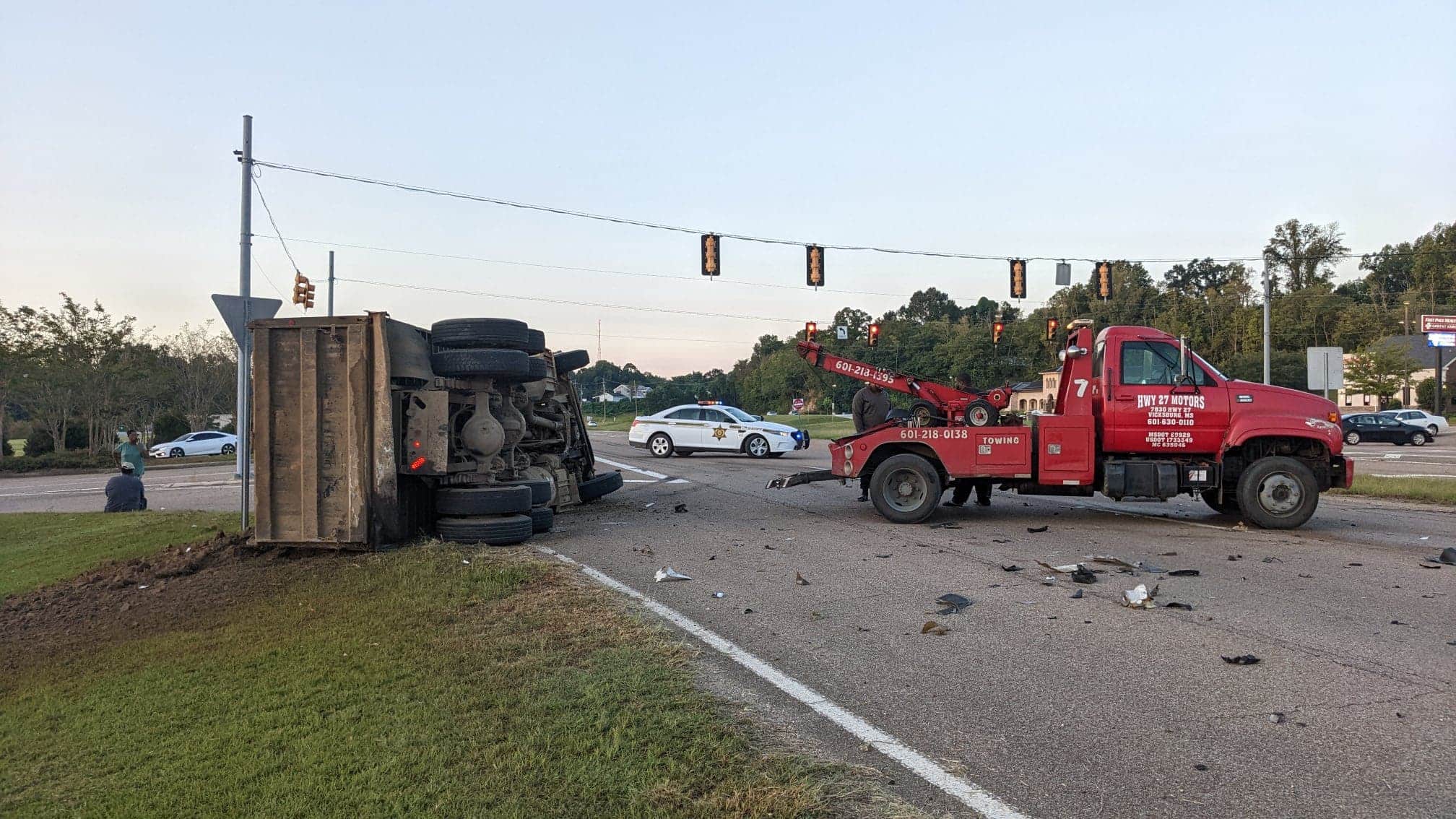 overturned dump truck river region