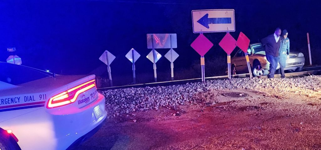 car stuck on railroad tracks