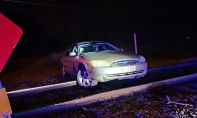 car stuck on railroad tracks