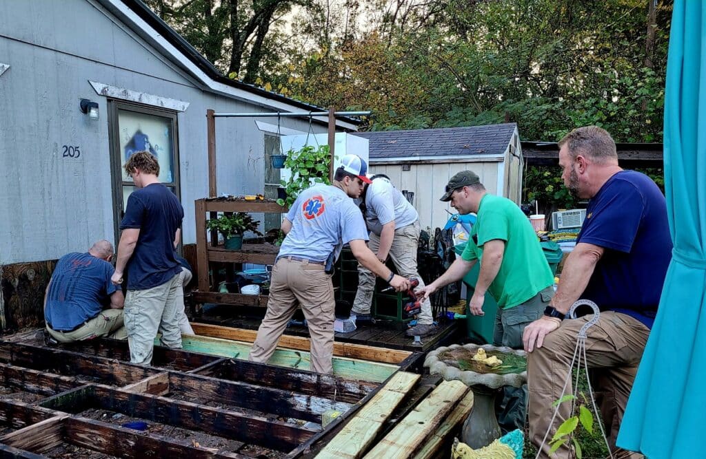 firefighters help fellow firefighter