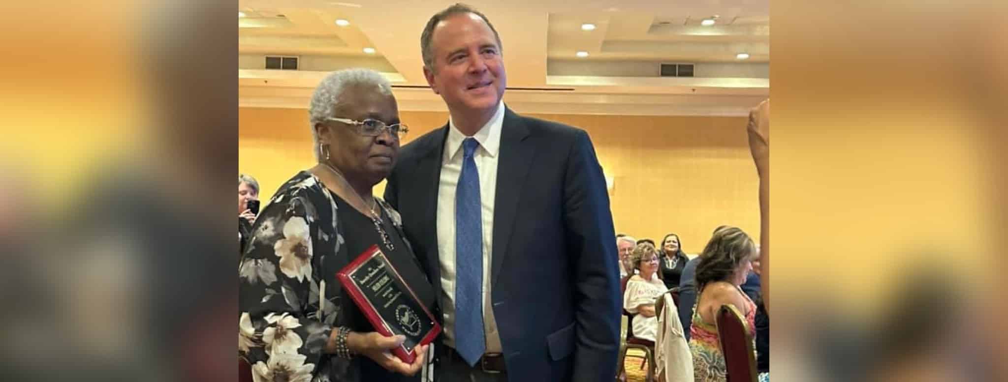 Helen Collins receiving award