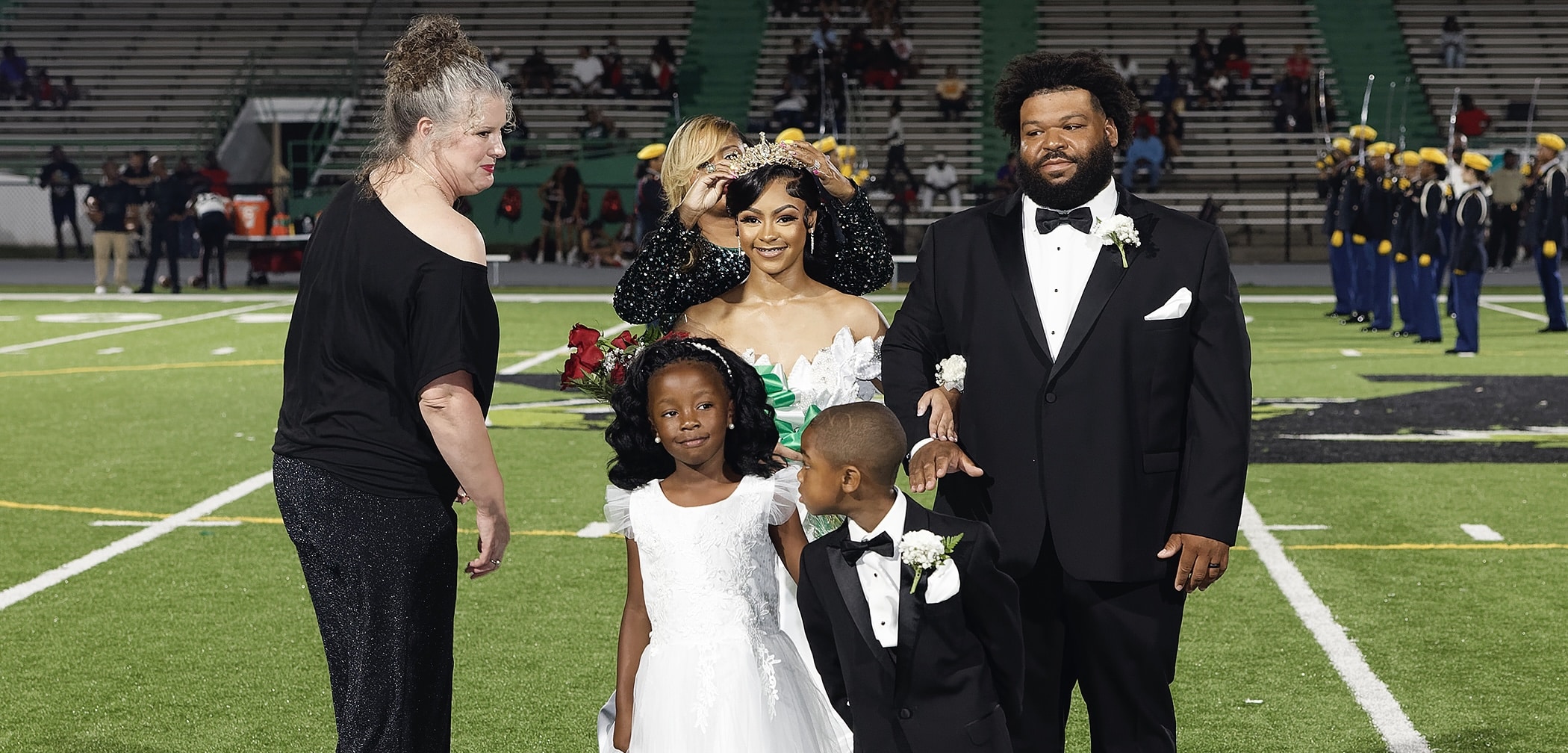 Assistant Principal Stacey Vaughn, Darius Claiborne and Homecoming Queen Aja Rader: Photo by Richard Miller