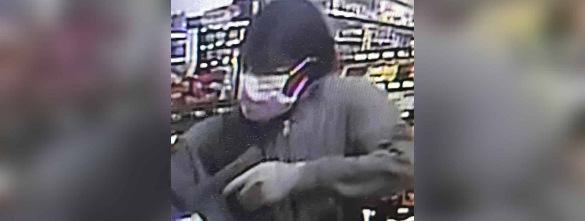 Man robbing store