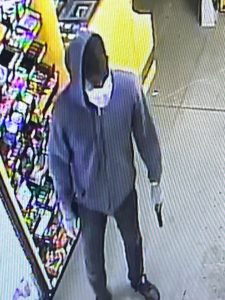 Man robbing store