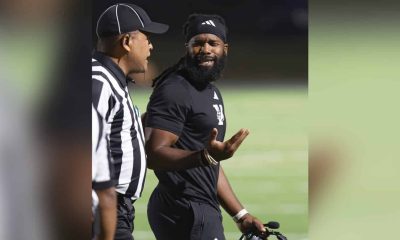 Christopher Lacey speaking to referee