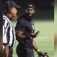 Christopher Lacey speaking to referee
