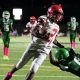 WC football player running ball