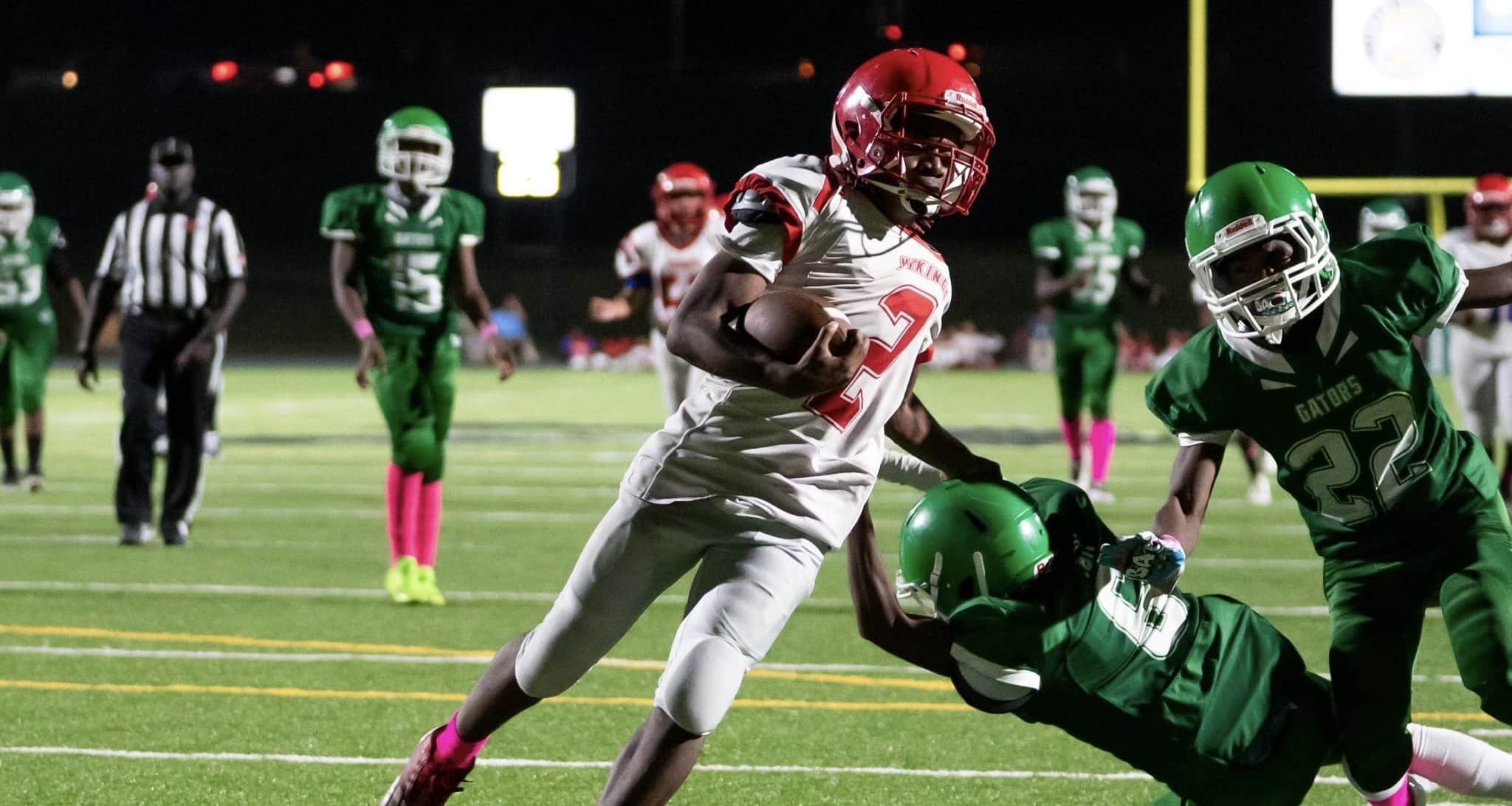 WC football player running ball