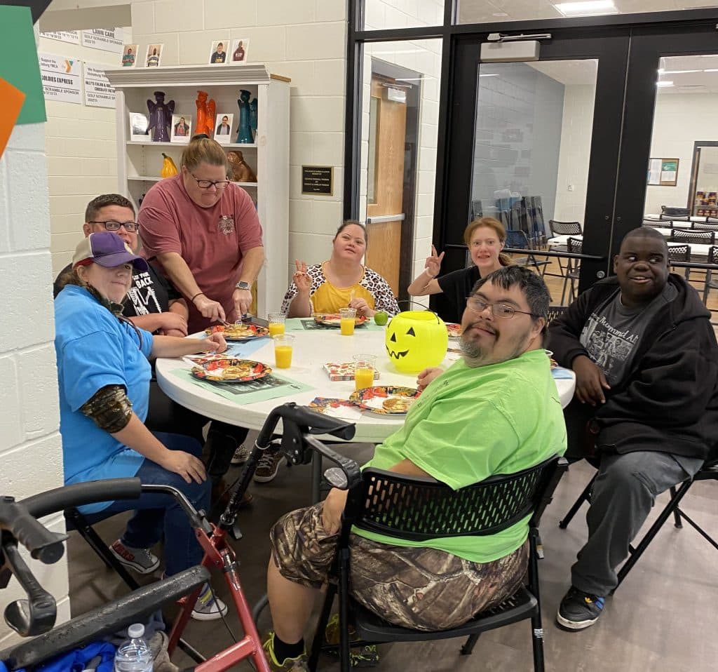 Members eating pancakes