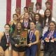 WC swim team holding trophy