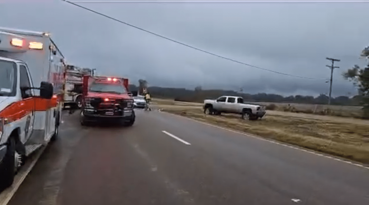 First responders work a one-vehicle accident with entrapment on 61.