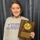 Kyleigh Cooper holding plaque