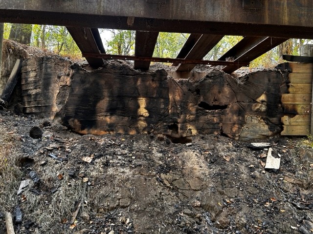 Police are looking into the burning of this bridge as a possible arson.