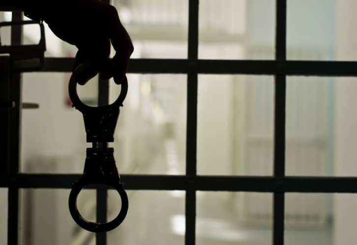 file art of handcuffs and jail