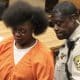 Jennifer Linear being escorted out of court